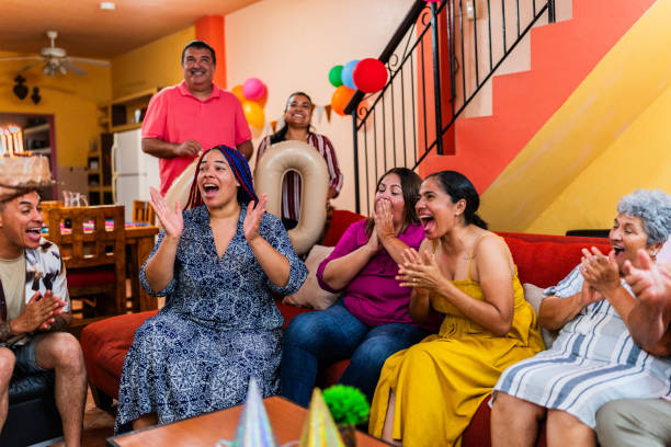 istock Family clapping during birthday party at home 2158579106