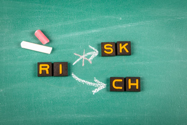 istock Rich Concept. Old letter tiles on a green chalkboard background 2158585361