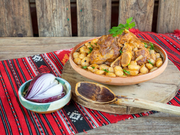 istock romanian traditional food, beans with boiled pork chop 2158586034