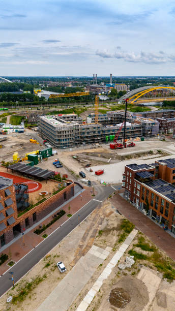 istock New complex of apartment buildings under construction. 2158592756