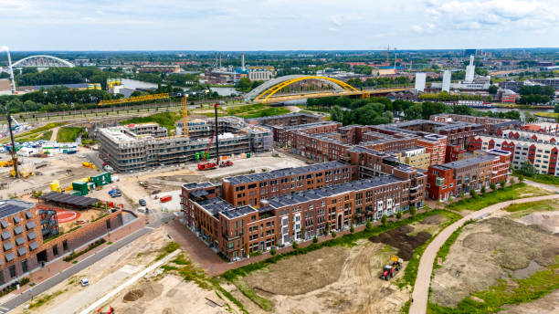 istock New complex of apartment buildings under construction. 2158592777