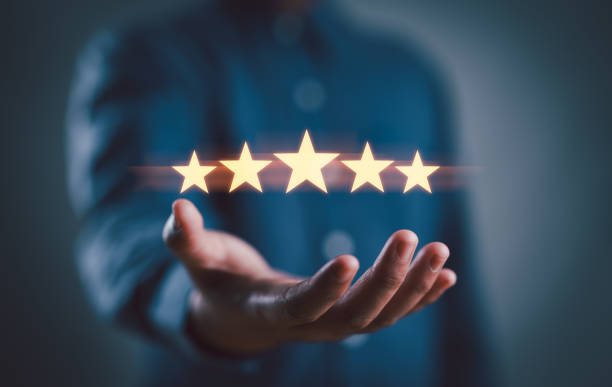 istock Customer evaluation feedback.men in suit Giving Positive Review for Client's Satisfaction Surveys.giving a five star rating. Service rating, satisfaction concept 2158593820