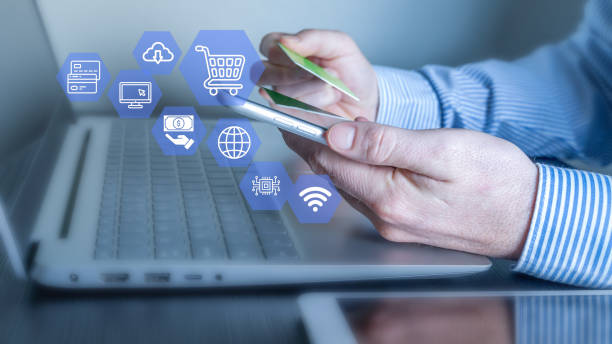 istock E-commerce, online shopping from mobile phone or laptop. 2158594155