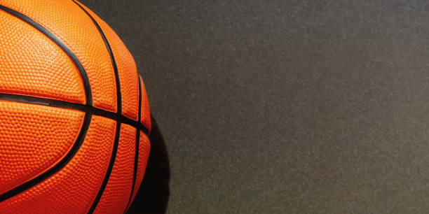 istock Web banner with detailed orange basketball and copy space for text 2158595178