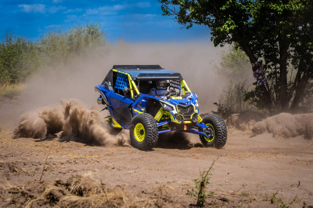 istock UTV kicking up sand on a dune. Extreme. 4x4. 2158596049