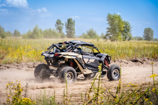 istock UTV buggy moves on dusty road. 4x4, extreme, adrenalin. 2158596093