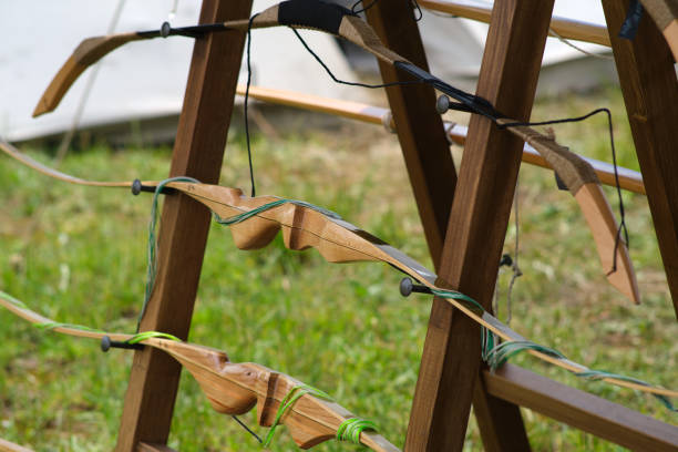 Retro-style weapon bows on a stand, close up