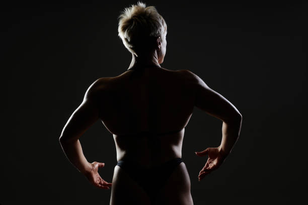 istock Female Athletes Back In Contour Light 2158600446