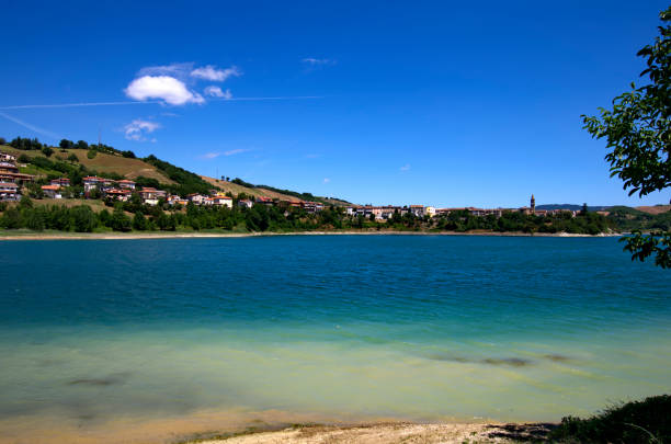 istock Lake landscape with a  hill against the sky 2158602861