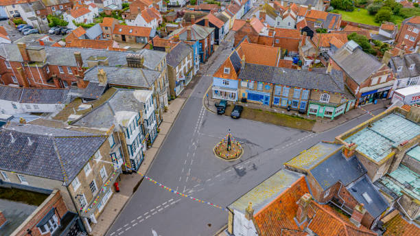Aerial photo from a drone of Southwold High Street on the Suffolk Coast, UK. Captured one early morning in June 2024.
