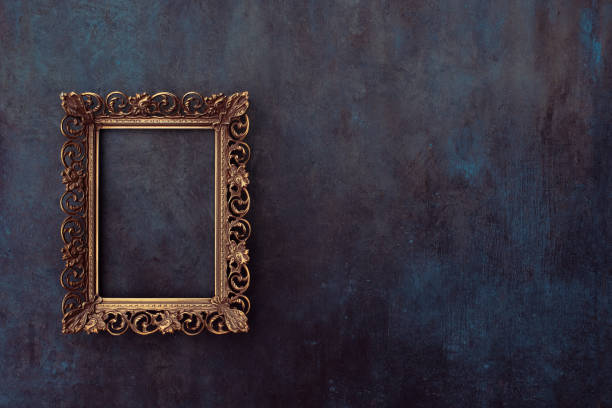 istock Golden metal frame mockup on a wall 2158606360