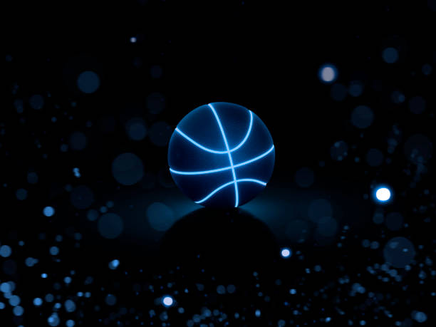 istock A black basketball ball has bright blue glowing neon lines on black background with abstract lights 2158606721