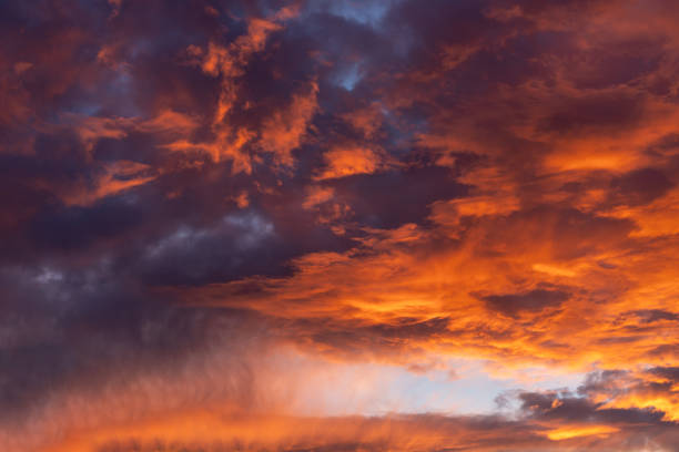 istock Dramatic fiery cloudy evening sky at sunset, clouds of bright colors 2158608261