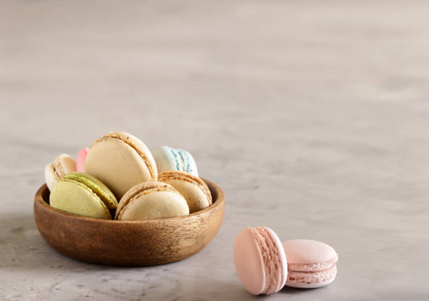 istock macaroons for dessert in a bowl on the table 2158615915