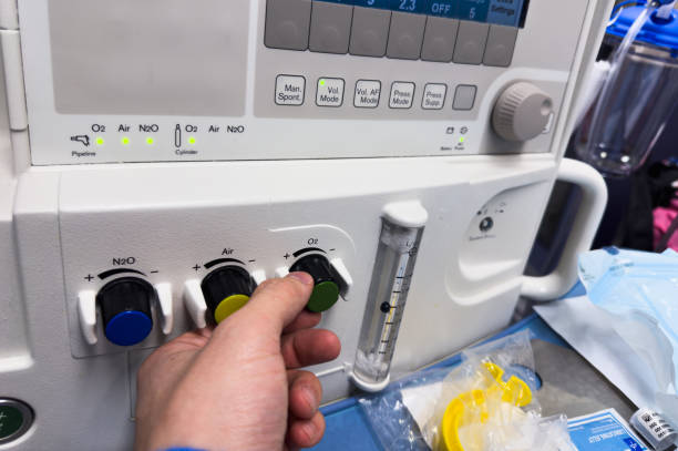 istock modern hospital anesthesia machine with airway ventilation system, featuring digital screens and various tubes, set in a clean and well-lit surgical room, ready for patient care 2158617551