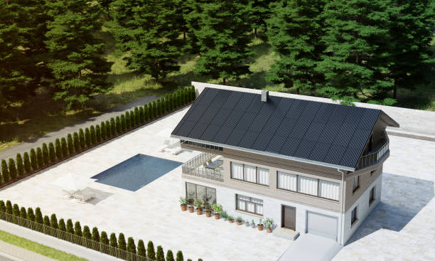 istock Modern Wood-Sided House with Pool Surrounded by Forest 2158618250