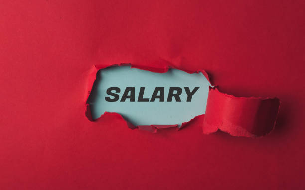 istock A red paper with the word salary written on it 2158625094