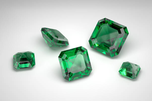 istock Scattering of emeralds of different sizes on the white background. Classic cut. 3d rendering. 2158627805