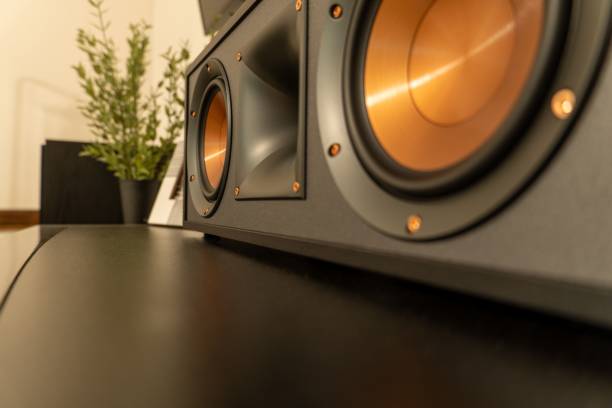 istock Close-up of a  loudspeaker with a copper cone in an interior setting 2158631647
