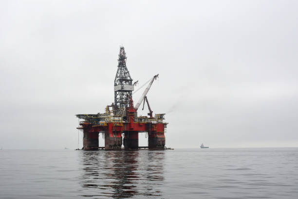Oil drilling platform in a calm sea. Pollution of the marine environment and industry