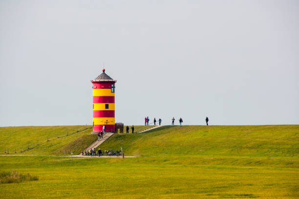 Germany, Pilsum. Famous lighthouse of Pilsum on the Wadden Sea in East Friesland.