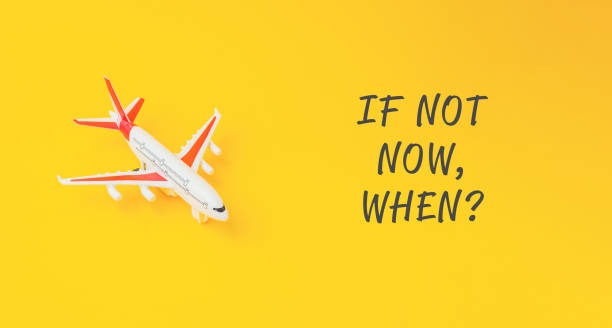 istock A small airplane is on a yellow background with the words If not now 2158640246