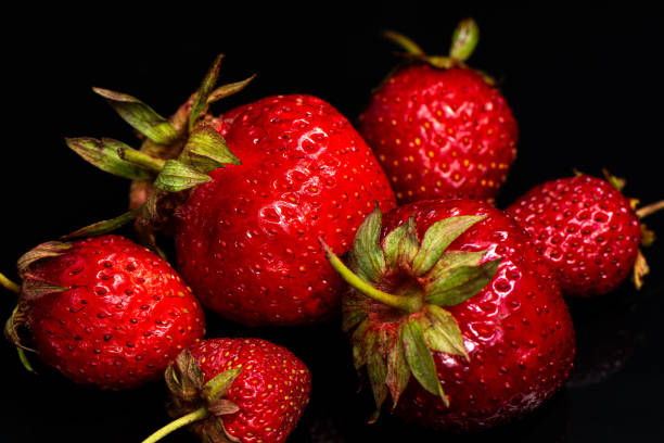 istock Fresh ripe natural strawberries on a black background. 2158640338