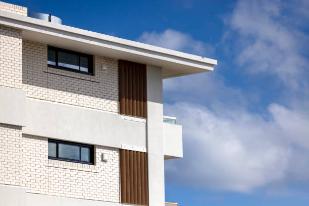istock Closeup brand new, modern apartment building, background with copy space 2158640465