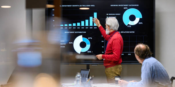 istock Mature Professional Leads Business Strategy Discussion 2158643934