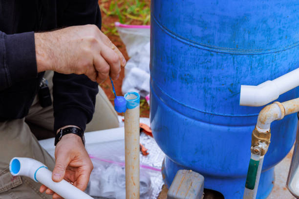 istock Water supply well system pump is being connected to a house water supply 2158644779