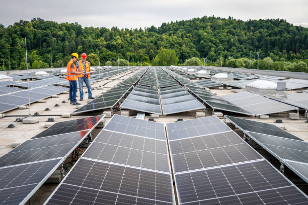 Free Stock Photo of Engineers consult on solar panel installation ...
