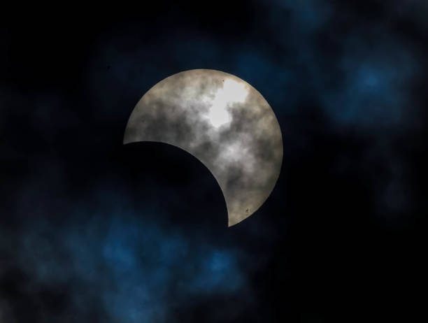 istock A large white moon is visible in the sky, with a blue and cloudy background 2158654569