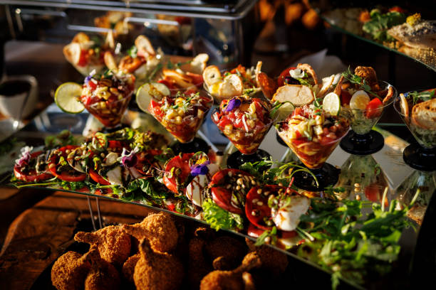 istock Vibrant gourmet appetizers, elegantly presented in glassware and bowls, adorned with fresh herbs and colorful vegetables 2158656212