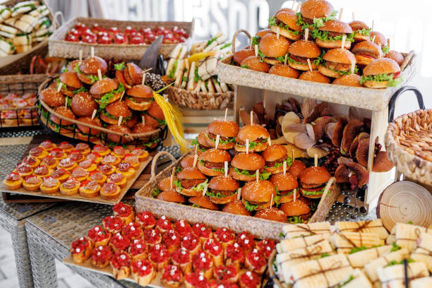 istock Mini burgers and other snacks served on the tray. Buffet or event catering concept. 2158656229
