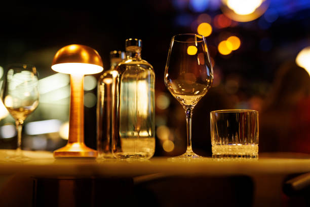 istock An empty clean wine glass stands on the table and awaits guests in a restaurant 2158656257