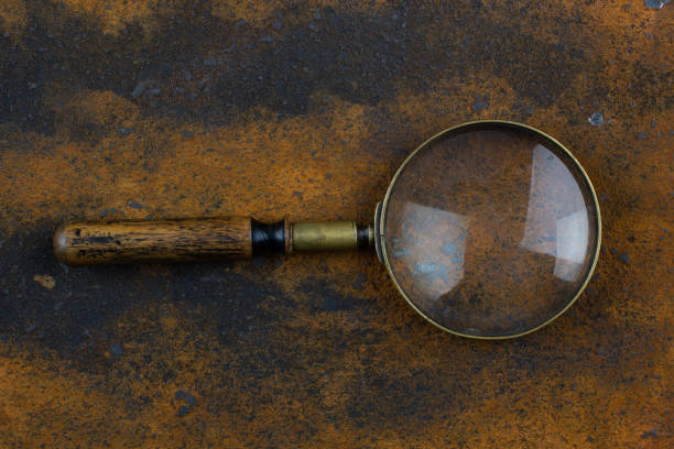 istock Vintage magnifying glass on metal rusty background, 2158666820
