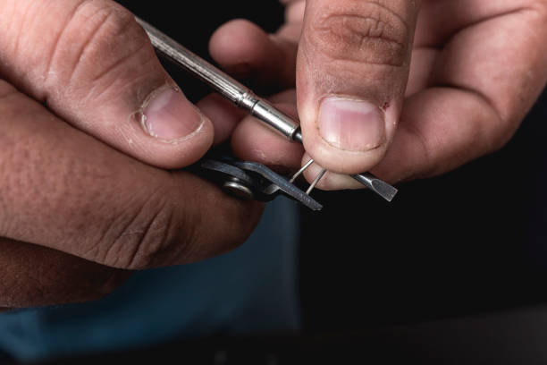 istock A man uses a small screwdriver to wrap a coil wire around. Forming a coil loop for a mod box vape build. 2158668171