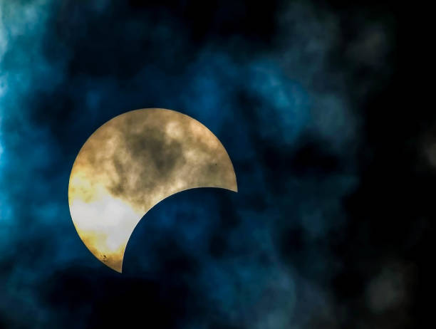 istock A large white moon is visible in the sky, with a blue and cloudy background 2158669881