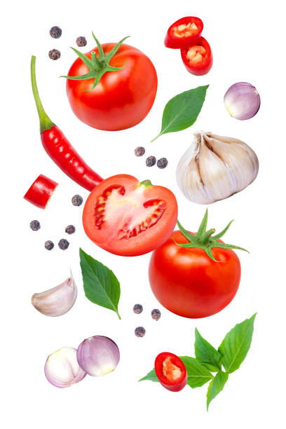 Tomato with basil leaves, garlic, onion, chili and black pepper