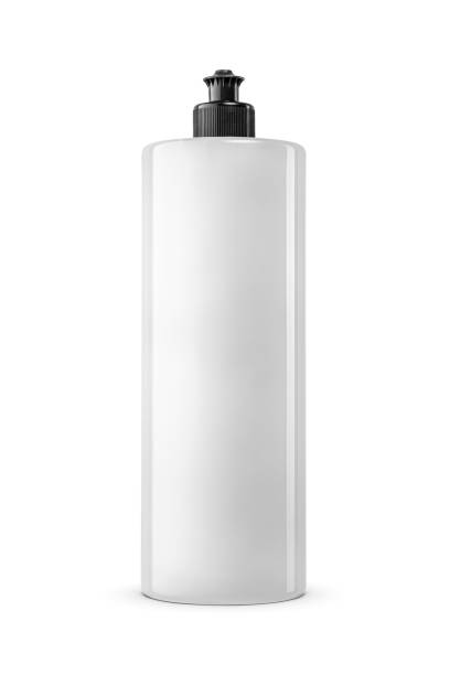 Large transparent plastic bottle with liquid soap, shampoo, shower gel isolated on white background. Black push pull cap dispenser.