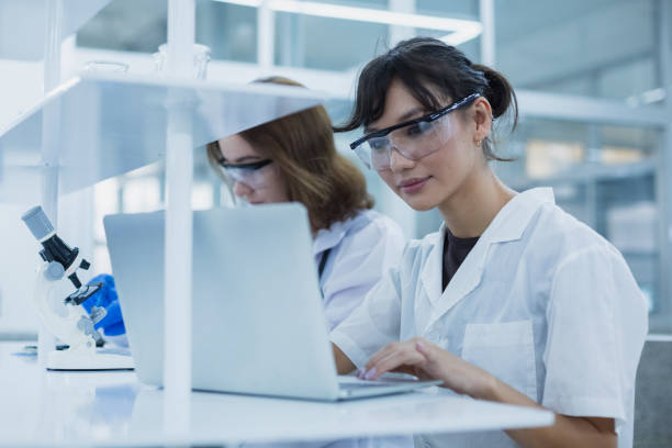 istock Science department students are working on research in medical science. Analyze medical data and innovate. advanced learning scientific chemistry biology. 2158679658