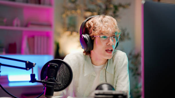 istock Young asian man  recording podcast from  home studio. 2158679714
