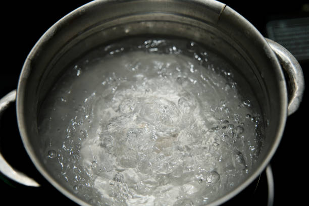 istock Pot on Stove with Boiling Water 2158682328