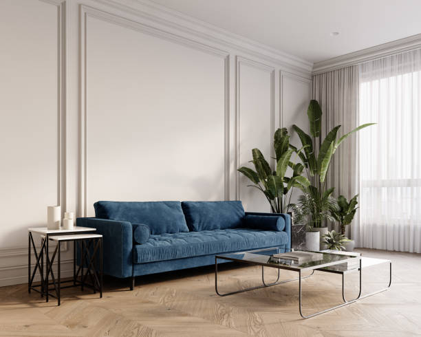 istock White contemporary classic interior with blue velour sofa, coffee tables, moldings, potted tropical plants and decor. 3d render illustration mockup. 2158685215