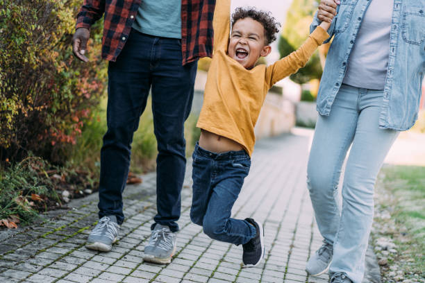 istock Happy family having fun outdoors. 2158686346