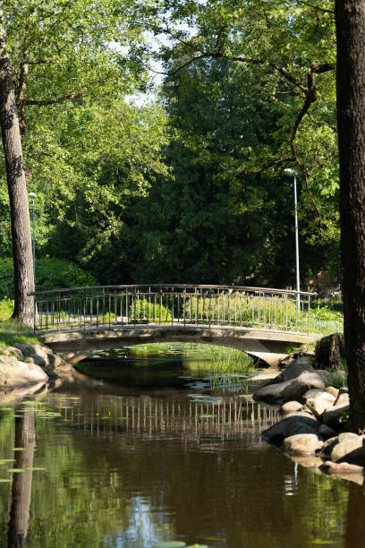 istock A beautiful bridge over the canal in public park in Riga. 2158691051