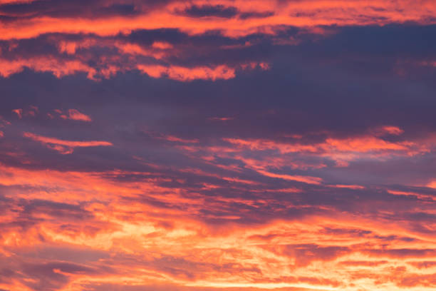 istock Orange-red colored cloudy sky after sunset, cloud formation, evening sky, sunset. 2158691384