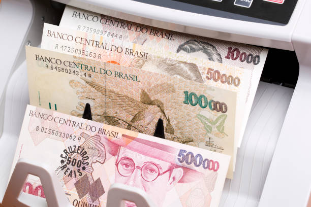istock Brazilian cruzeiro in the counting machine 2158691607