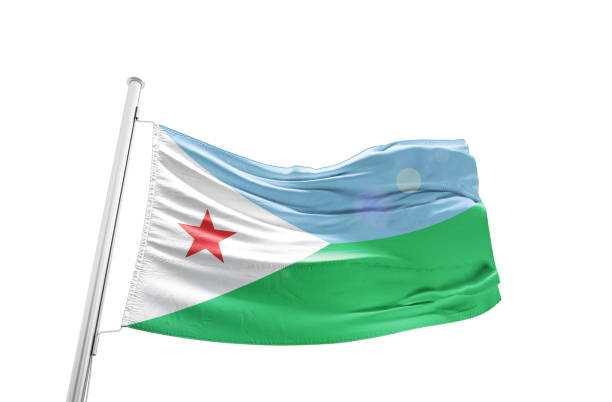 Small paper flag of South Sudan pinned. Isolated on white background. Horizontal orientation. Close up photography. Copy space.