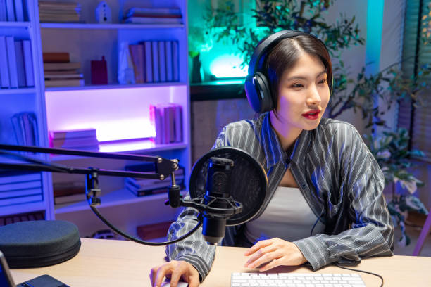 istock Asian woman live online podcast 2158692289